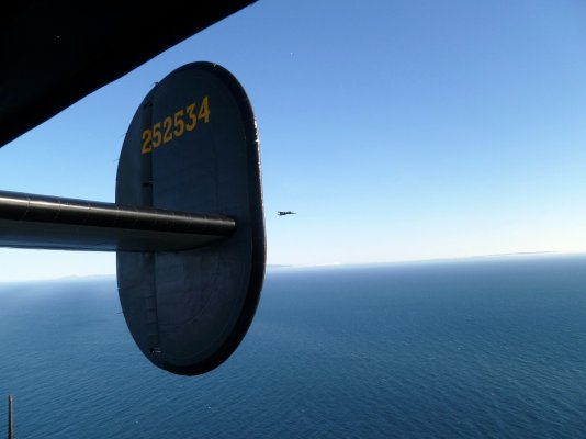 B-24 in flight B-17 in background.jpg