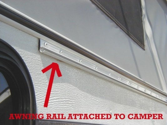 old awning rail attached to camper.jpg