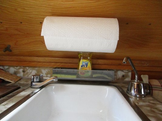 basket and towel holder above sink.jpg