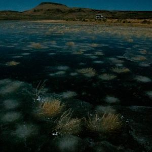 Frozen Big Spring Reservoir Camp at Night