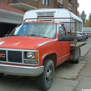 69 #822 10 NCO & 92 GMC 3500 Flatbed 10'