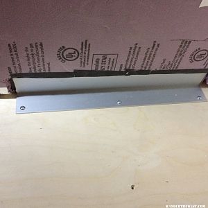 L bracket to hold fridge in place