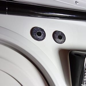 Double stick tape behind washers