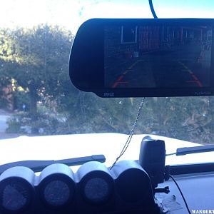 Podman Dash Pod w/Gauges, Brinno Time Lapse Camera and Pyle Backup Camera Monitor over Rear View Mirror