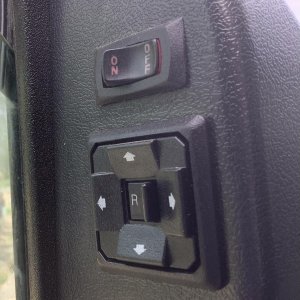 2004 E350 rear view mirror control with heated mirror on/off switch.