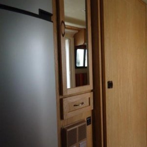 Finished fridge/pantry area - extra drawer under pantry closet to reclaim dead space.