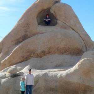 Grandson, Michael in the cave, granddaughter, Layla Mae with Aampa on the ground.  Joshua Tree NP 2017