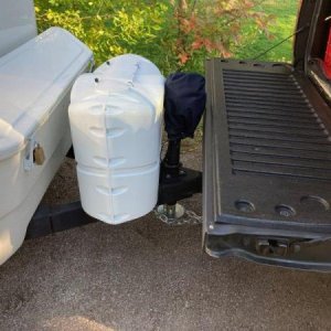 the tailgate open with the trailer hooked up, its often used to cook or prepare a meal, as work bench to do a repair. We have a small tarp that can be