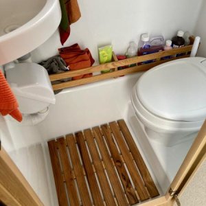 I added a teak bath mat to the shower.