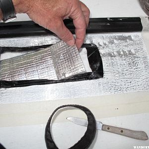 Inserting a scrap of insulation