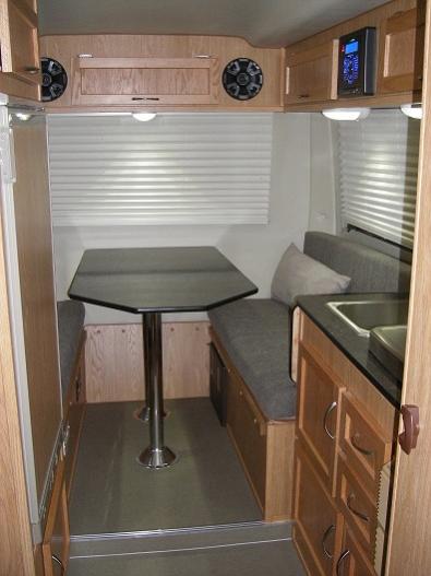 Large dinette area before blackout drapes were added.  I requested the lighter cellular blinds they used to use as they make the space feel larger.  T