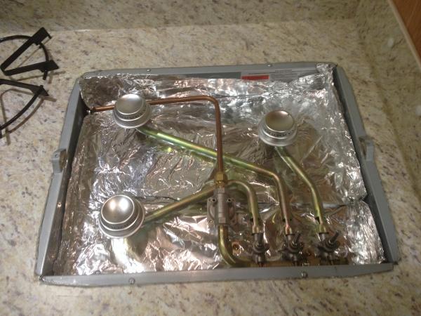 Not exactly a Mod ... to help keep things clean I lined the Stove with Foil