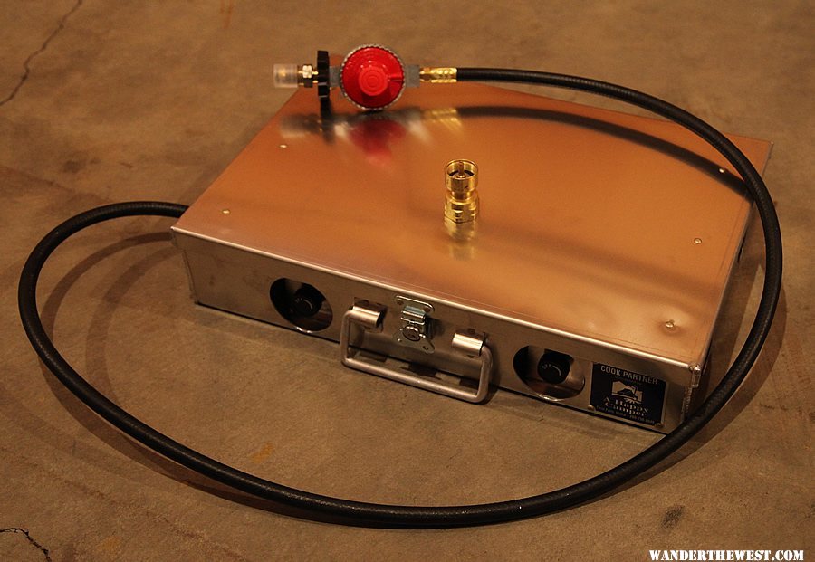 Partner stove with hose, regulator, and optional adapter for one pound propane cylinders