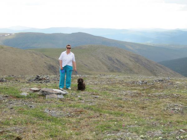 Top of the world "Yukon" Us border. And that's Lucy Dog with the navigator AKA "The Boss" .