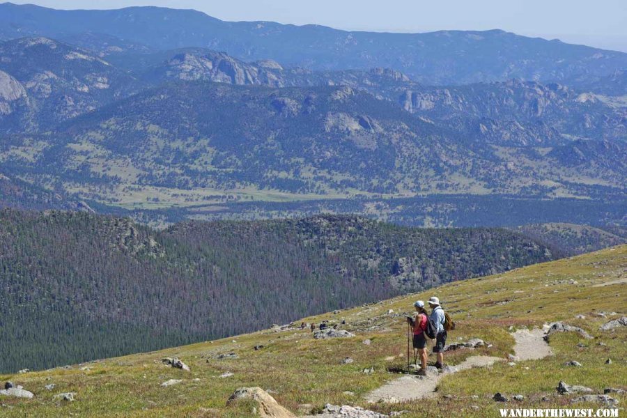 Tourists Take in the View on the Flattop Mnt Trail