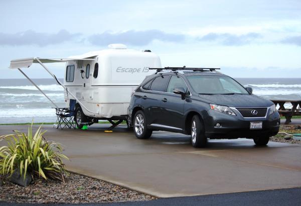 Towing trailer with a Lexus RX350 AWD w\tow package. Even though it's only a V6 I was happy with it's performance. Experienced zero sway with the trai