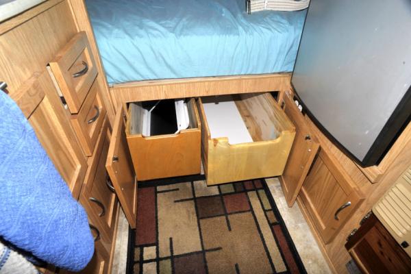 Two deep storage drawers under the bed.