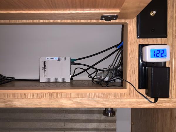 WiFi Rangers Elite Flat Mount, GoAC Router in the cabinet next to the fridge.